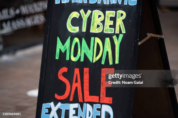 Sign that reads, "Cyber Monday sale" is posted outside a store in Kips Bay on December 04, 2020 in New York City. Many holiday events have been...
