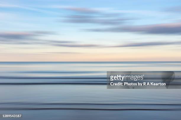 sea and sky abstract at dusk - serenità foto e immagini stock