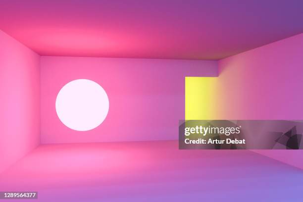 playing with colorful neon lights in indoor spaces with creative and minimal style. - yellow room stock pictures, royalty-free photos & images