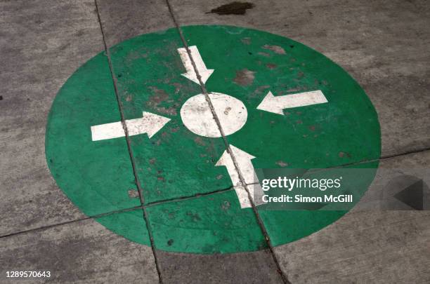 evacuation assembly point sign painted on a concrete driveway - earthquake drill stock pictures, royalty-free photos & images