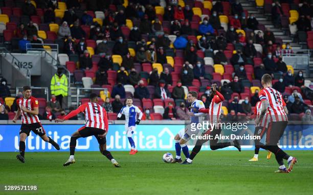Joe Rothwell of Blackburn Rovers scores his sides first goal during the Sky Bet Championship match between Brentford and Blackburn Rovers at...