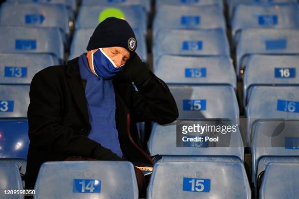 Chelsea fan reacts in the stands prior to the Premier League match between Chelsea and Leeds United at Stamford Bridge on December 05, 2020 in...