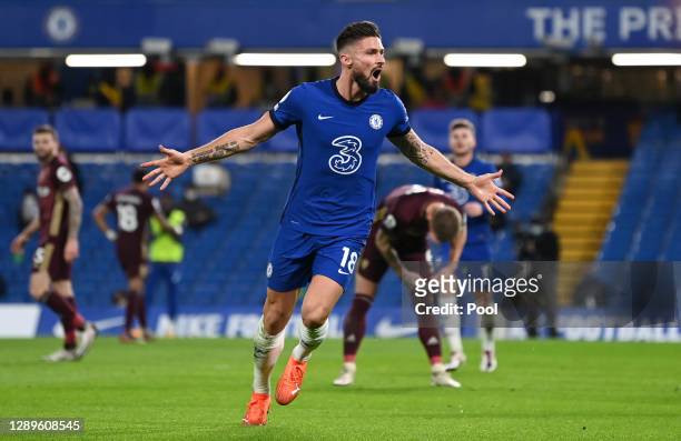 Olivier Giroud of Chelsea celebrates after scoring their team's first goal during the Premier League match between Chelsea and Leeds United at...