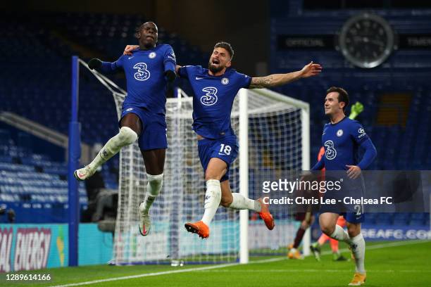 Kurt Zouma of Chelsea celebrates with teammates Olivier Giroud and Ben Chilwell after scoring their team's second goal during the Premier League...