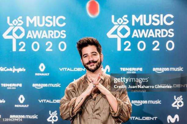 Colombian singer Camilo attends 'Los 40 Music Awards' photocall at Movistar Studios on December 06, 2020 in Madrid, Spain.