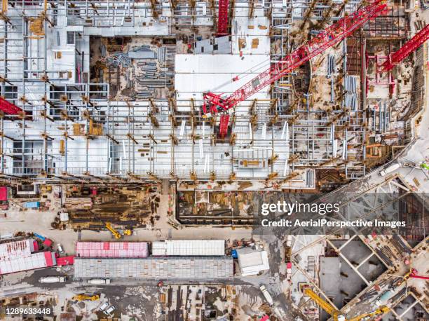 top view of working construction site - sozialwohnung stock-fotos und bilder