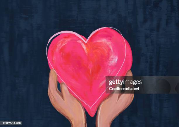 two hands holding pink and red heart. concept of love and care. - joy stock illustrations