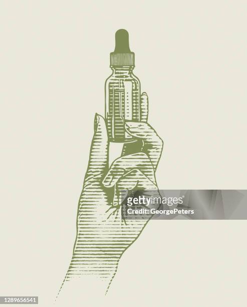 handhaltung cbd ölflasche und pipette - bottle illustration vintage stock-grafiken, -clipart, -cartoons und -symbole