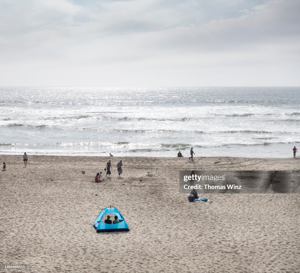 People relaxing on the beach