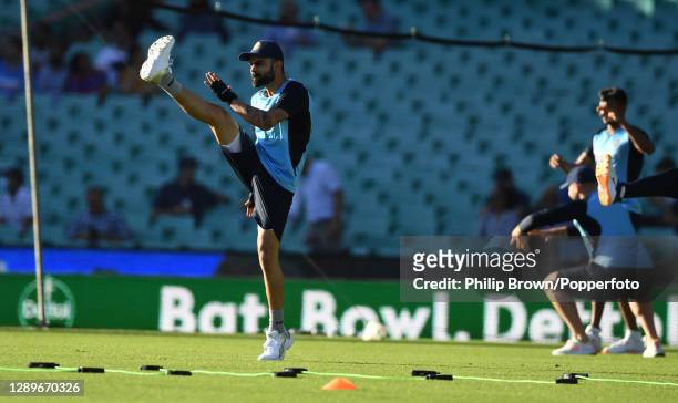 Virat Kohli of India warms up before game two of the Twenty20 International series between Australia and India at Sydney Cricket Ground on December...