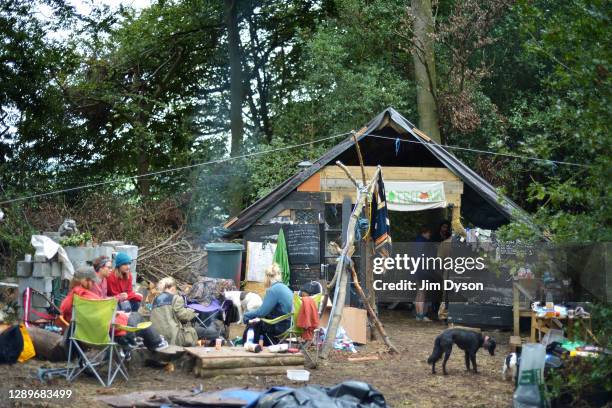 View of the café area at a protest camp in Jones Hill Wood against the HS2 High Speed Rail line and its proposed route through the Chilterns ‘Area of...