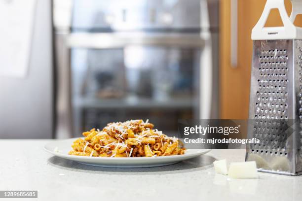 food trends. macaroni bolognese - bolognese sauce stock pictures, royalty-free photos & images
