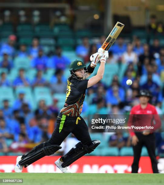 Steve Smith of Australia hits out during game two of the Twenty20 International series between Australia and India at Sydney Cricket Ground on...