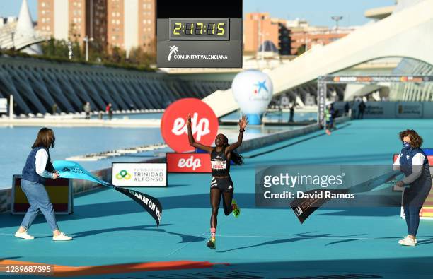 Peres Jepchirchir of Kenya wins the Women’s Marathon with a Course Record in Valencia wearing the adidas adizero adios pro during the Valencia...
