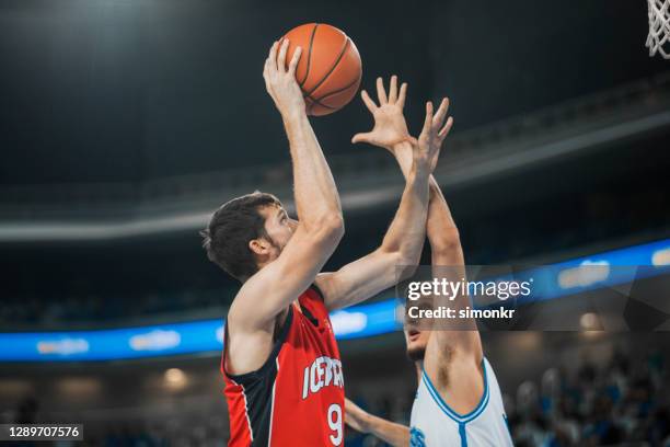 basketball players chasing for ball - basketballs stock pictures, royalty-free photos & images