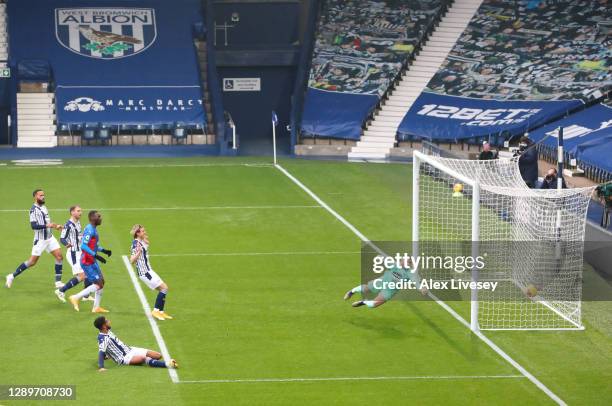 Darnell Furlong of West Bromwich Albion scores an own goal past Sam Johnstone of West Bromwich Albion to make it the first goal for Crystal Palace...