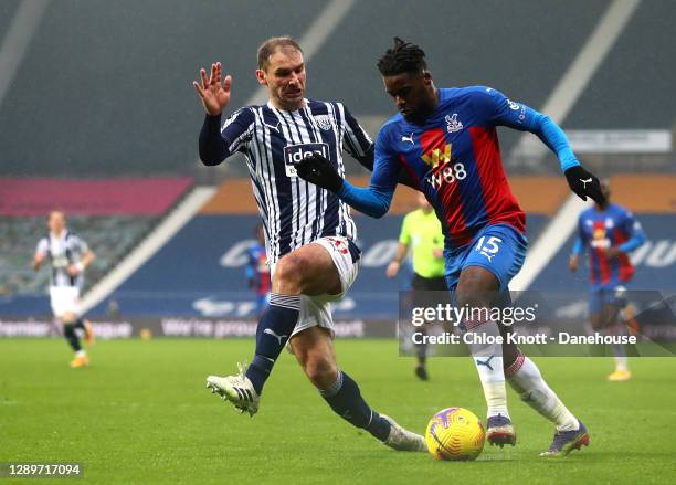 Branislav Ivanovic of West Bromwich Albion and Jeffrey Schlupp of Crystal Palace in action during the Premier League match between West Bromwich...
