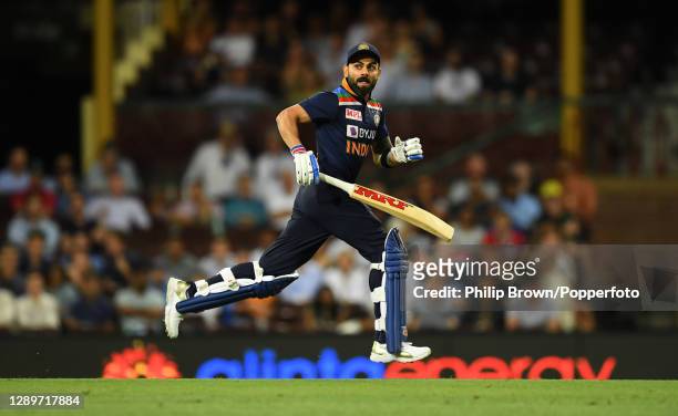 Virat Kohli of India runs during game two of the Twenty20 International series between Australia and India at Sydney Cricket Ground on December 06,...