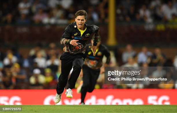 Mitchell Swepson of Australia chases the ball during game two of the Twenty20 International series between Australia and India at Sydney Cricket...