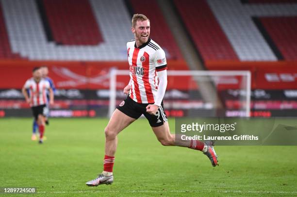 Oliver McBurnie of Sheffield United celebrates after scoring their team's first goal during the Premier League match between Sheffield United and...
