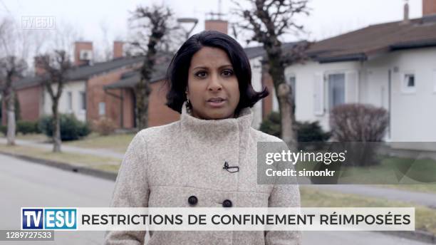 news reporter live broadcasting on road - infectious disease stock pictures, royalty-free photos & images