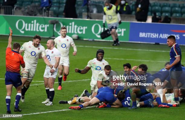 Luke Cowan-Dickie of England scores their sides first try to go to extra time as Henry Slade of England celebrates during the Autumn Nations Cup...