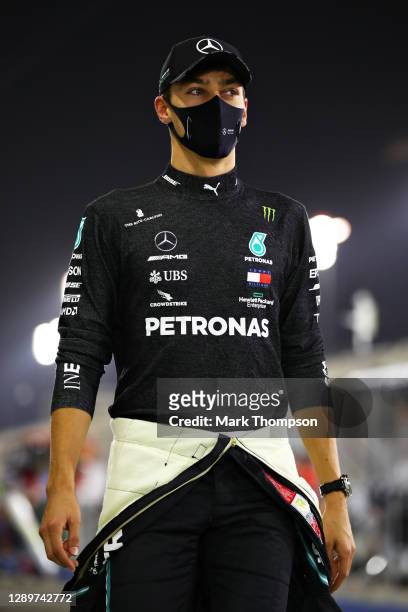 George Russell of Great Britain and Mercedes GP looks on before the F1 Grand Prix of Sakhir at Bahrain International Circuit on December 06, 2020 in...