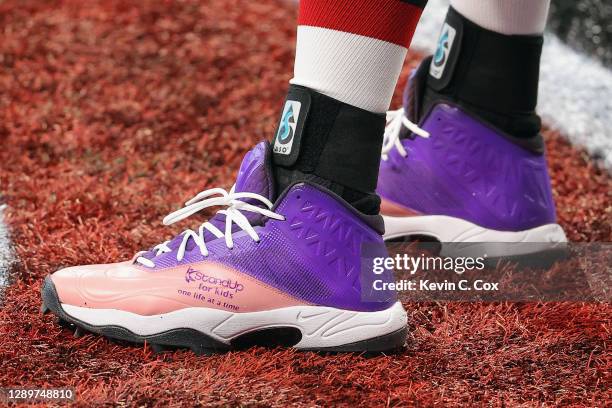 Close-up view of the cleats worn by Alex Mack of the Atlanta Falcons promoting the StandUp for Kids charity prior to the game against the New Orleans...