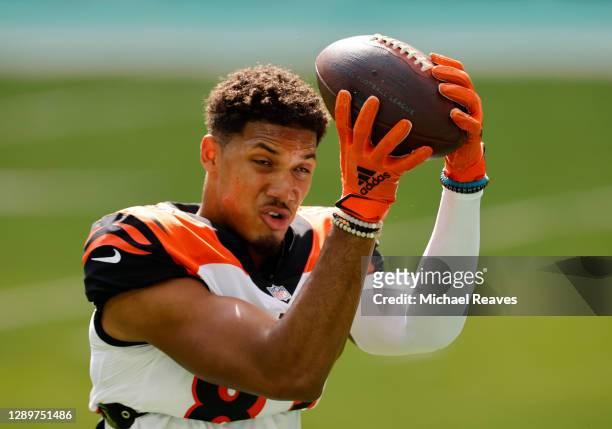 Wide receiver Tyler Boyd of the Cincinnati Bengals catches a ball during warm-up prior to the game against the Miami Dolphins at Hard Rock Stadium on...