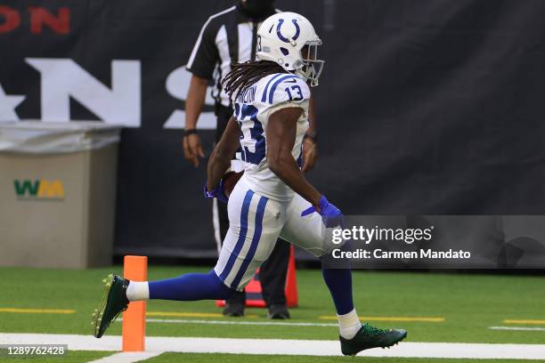 Hilton of the Indianapolis Colts scores on a 21-yard touchdown reception against the Houston Texans during the first half at NRG Stadium on December...