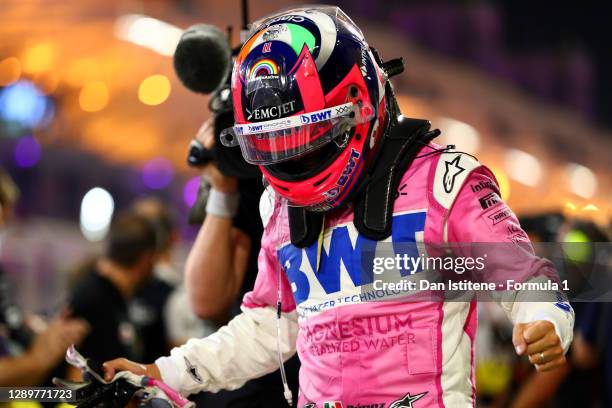 Race winner Sergio Perez of Mexico and Racing Point celebrates his maiden F1 victory in parc ferme during the F1 Grand Prix of Sakhir at Bahrain...
