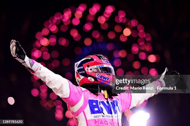 Race winner Sergio Perez of Mexico and Racing Point celebrates his maiden F1 victory in parc ferme during the F1 Grand Prix of Sakhir at Bahrain...