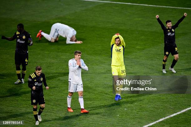 The New England Revolution and Columbus Crew react to the Columbus Crew's 1-0 win during the Eastern Conference Final of the MLS Cup Playoffs at...