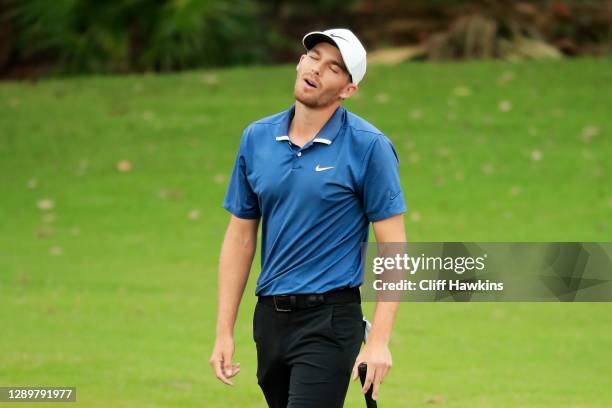 Aaron Wise of the United States reacts to his missed birdie putt on the 18th green during the final round of the Mayakoba Golf Classic at El Camaleón...