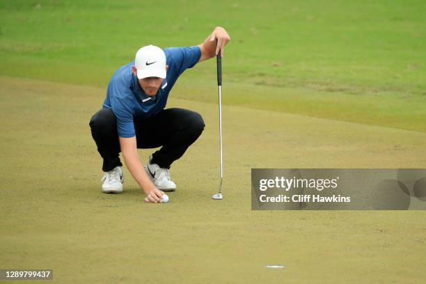Aaron Wise of the United States lines up a putt on the 18th green during the final round of the Mayakoba Golf Classic at El Camaleón Golf Club on...
