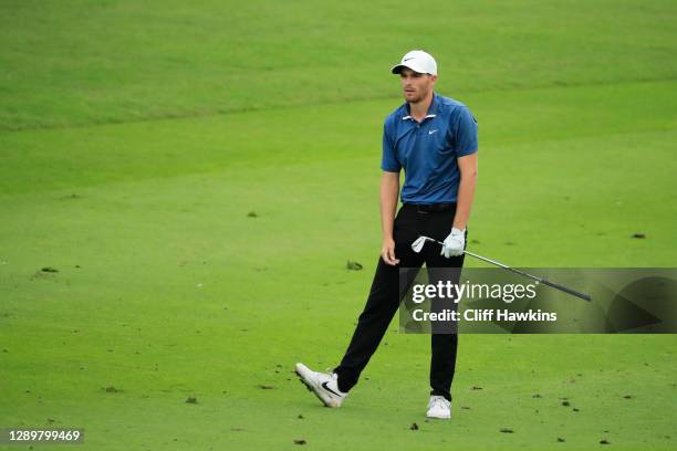 Aaron Wise of the United States reacts to his second shot on the 18th hole during the final round of the Mayakoba Golf Classic at El Camaleón Golf...