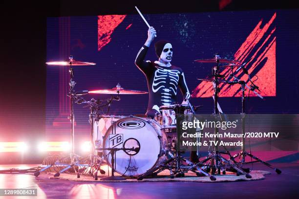 In this image released on December 6, Travis Barker performs at the 2020 MTV Movie & TV Awards: Greatest Of All Time broadcast on December 6, 2020.