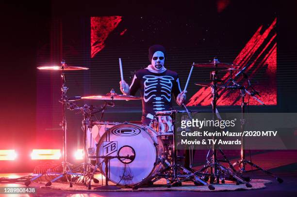 In this image released on December 6, Travis Barker performs at the 2020 MTV Movie & TV Awards: Greatest Of All Time broadcast on December 6, 2020.