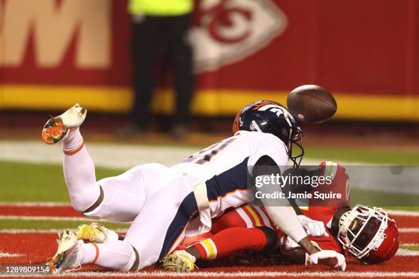 Bouye of the Denver Broncos breaks up a pass intended for Tyreek Hill of the Kansas City Chiefs during the second quarter of a game at Arrowhead...