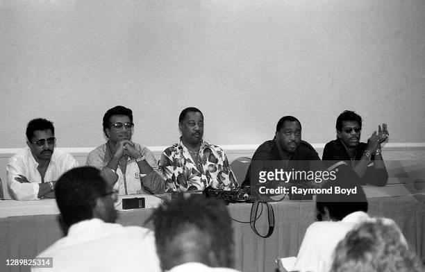 Singers Ron Tyson, Richard Street, Melvin Franklin, Otis Williams and Ali-Ollie Woodson of The Temptations answers questions during a press...