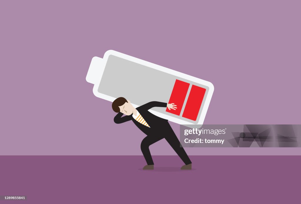 An employee carries a low battery