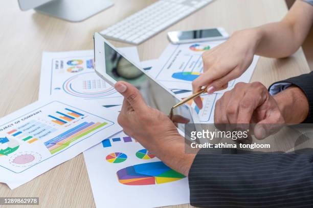 business team investment entrepreneur trading discussing and analysis graph stock market trading, stock chart. - conformity stock pictures, royalty-free photos & images