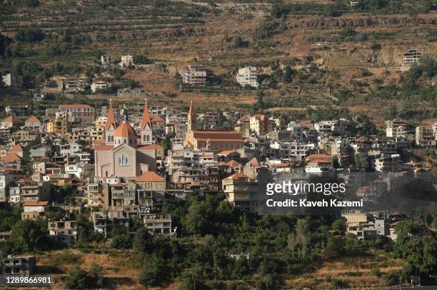 Church is seen from a distant view of the birthplace of the famous poet, painter and sculptor Khalil Gibranvillage on September 28, 2020 in Bsharri,...