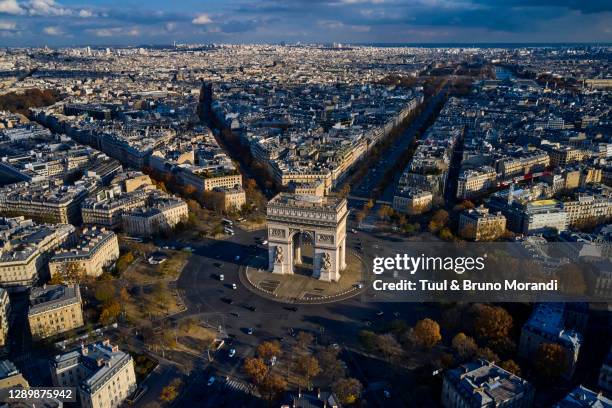 france, paris, place charles de gaulle or de l'etoile, and the arc of triomphe - arc de triomphe aerial view stock pictures, royalty-free photos & images