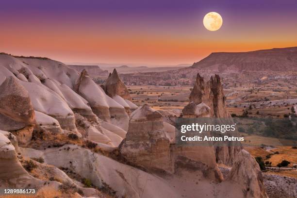 full moon over love valley, cappadocia, turkey - capadócia imagens e fotografias de stock