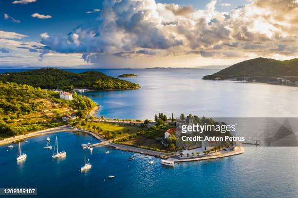 aerial view of vis town on vis island, croatia - croazia foto e immagini stock