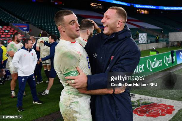Sam Underhill of England embraces Ben Earl of England following their side's victory during the Autumn Nations Cup Final & Quilter International...