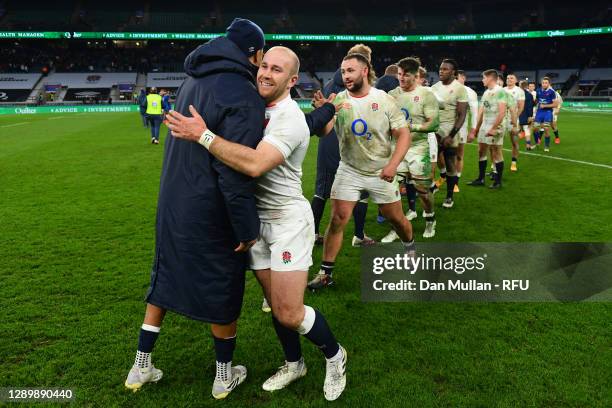 Dan Robson of England embraces Anthony Watson of England following their side's victory during the Autumn Nations Cup Final & Quilter International...