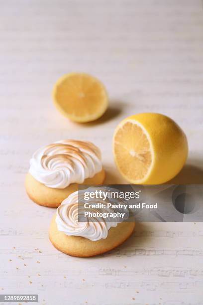 lemon cookies with italian meringue - burnt cookies stock pictures, royalty-free photos & images