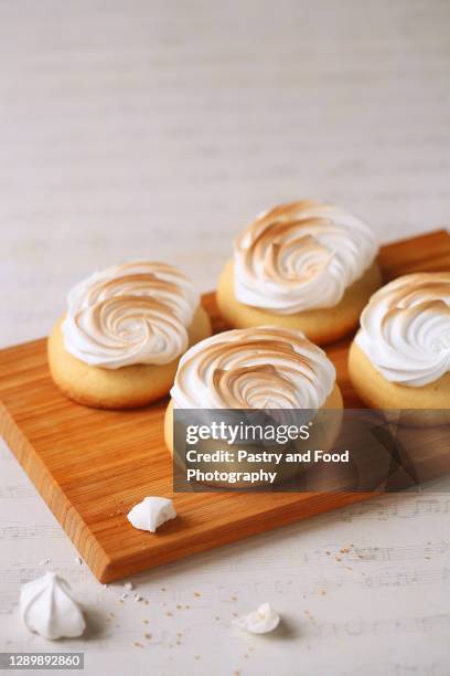 lemon cookies with italian meringue - burnt cookies stock pictures, royalty-free photos & images